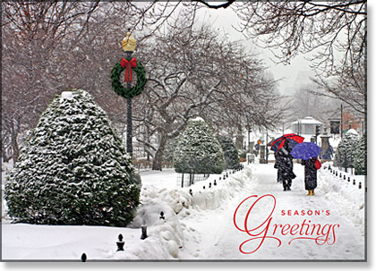 This holiday card shows holiday shoppers strolling through a snowy Boston's Public Garden.