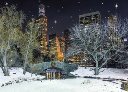 Wintertime at Gapstow Bridge and pond in Central Park under a blanket of snow holiday card.