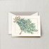 An eye catching engraved holiday card on Ecru paper with a Juniper sprig tied in a brushed silver bow will make an elegant holiday card this year for your company or firm.  Personalize the inside of this company with your holiday message and company name.